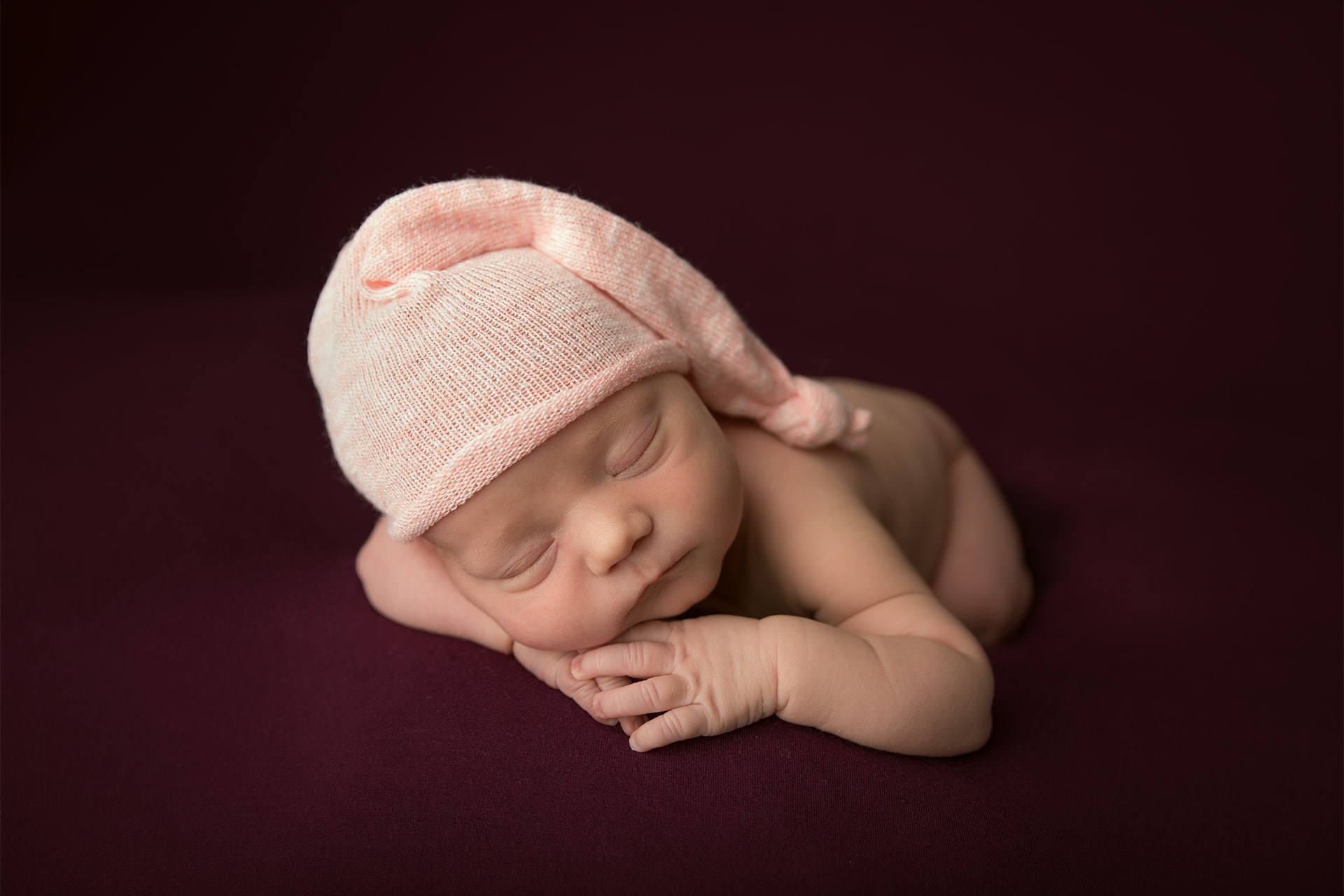 hiring a professional newborn photographer